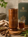 Vedamrit Vijaysar Wood Glass with packaging and herbs